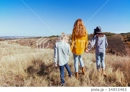 Happy family - mom and two daughters 34853463