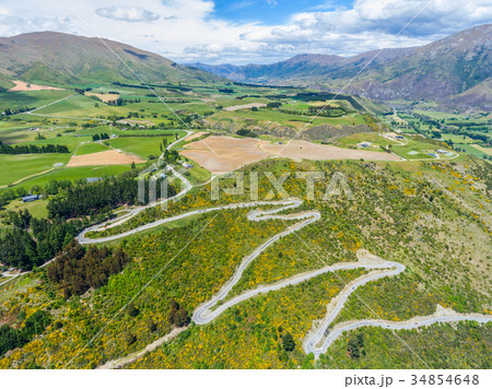 Winding Road on Mountain, Queenstown, New Zealand Winding Road on Mountain, Queenstown, New Zealand 34854648