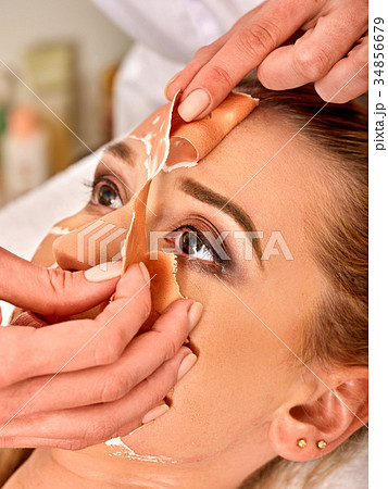 Collagen face mask. Facial skin treatment. Woman 34856679