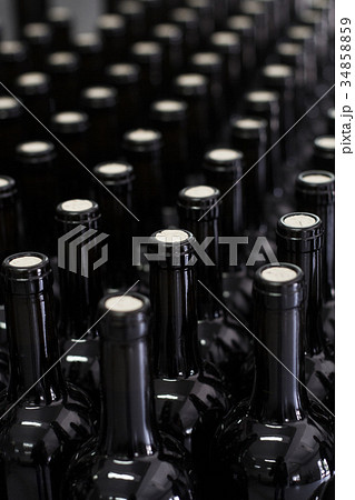 wine being bottled at the winery 34858859