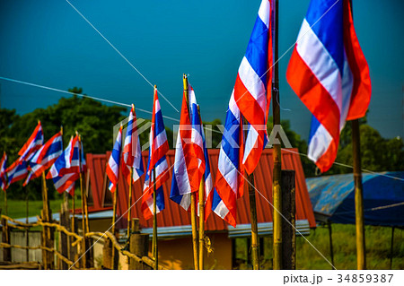 Image of waving Thai flag of Thailand with blue sk Image of waving Thai flag of Thailand with blue sk 34859387