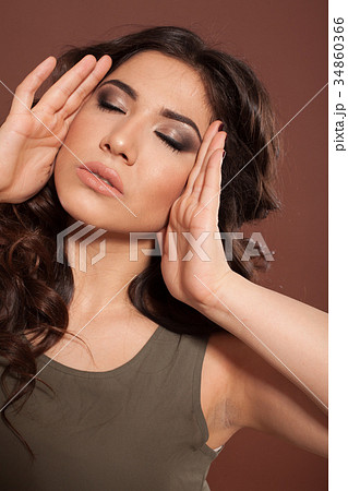 beautiful girl hairstyle curls on a brown beautiful girl hairstyle curls on a brown 34860366