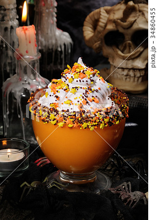 Pumpkin dessert with whipped cream 34860455