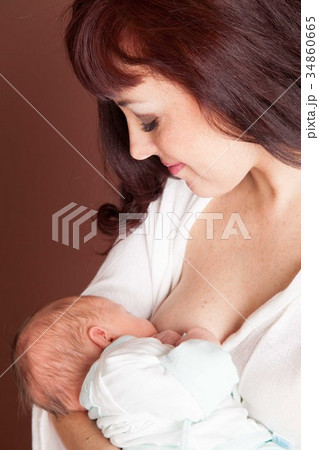 mom feeding babe the son of breast milk mom feeding babe the son of breast milk 34860665