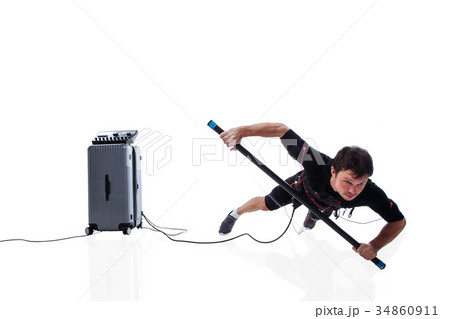 Man doing one hand plank with EMS 34860911