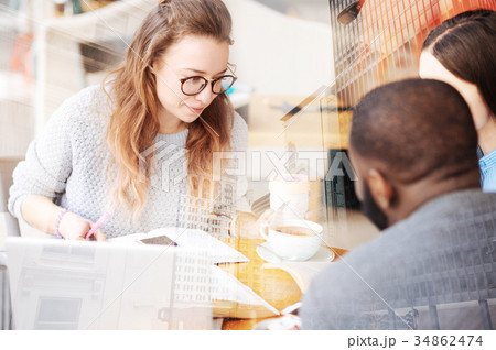 Diligent students having exciting discussion 34862474
