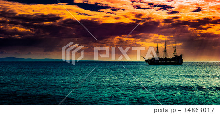 A lone ship against the morning sky. 34863017