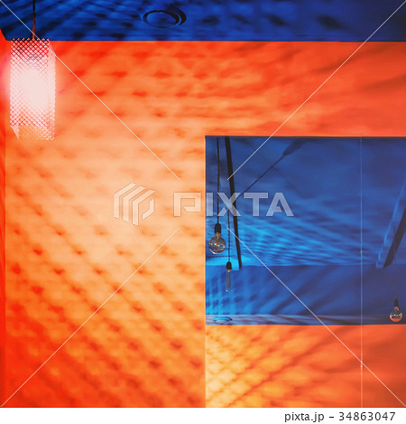 Blue Ceiling and Orange Wall With Mirror Blue Ceiling and Orange Wall With Mirror 34863047