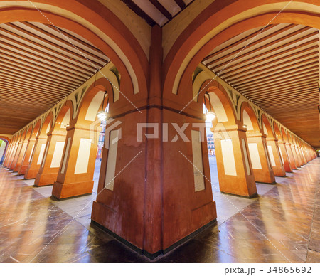 Spain, Andalusia, Cordoba, Plaza de la Corredera, Arcade in diminishing perspective 34865692