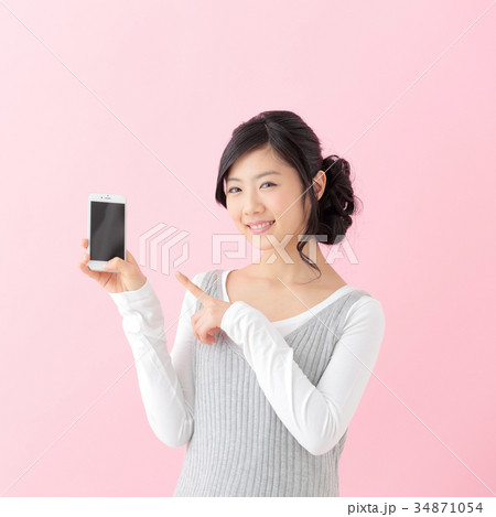 若い女の子　スマートフォン 34871054