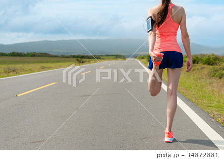 back view photo of beautiful young female runner 34872881