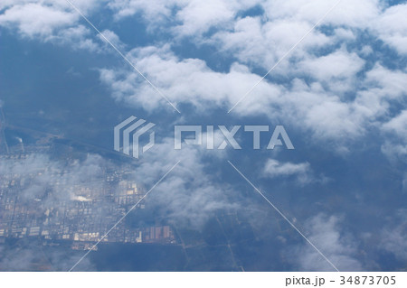 View above the earth at the clouds 34873705