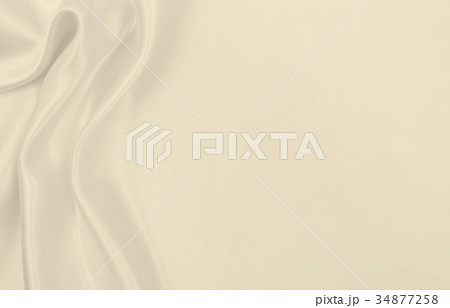 Smooth elegant golden silk or satin luxury cloth Smooth elegant golden silk or satin luxury cloth 34877258