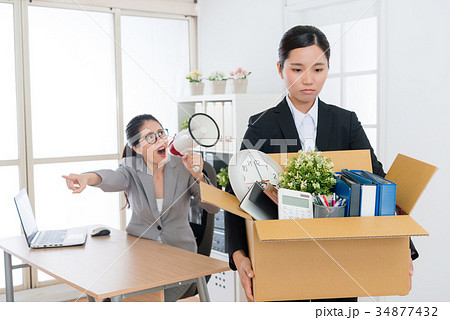 business girl holding personal belongings box business girl holding personal belongings box 34877432