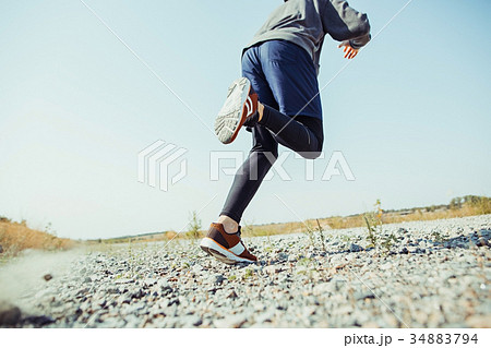 Running sport. Man runner sprinting outdoor in Running sport. Man runner sprinting outdoor in 34883794