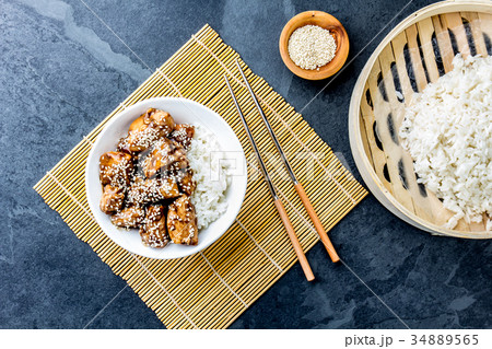 Japanese food. Chicken teriyaki with rice. slate 34889565