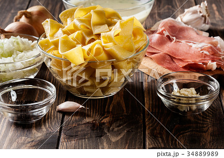 Ingredients ready for preparing pappardelle Ingredients ready for preparing pappardelle 34889989