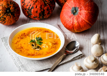 Pumpkin soup with seeds and parsley. Vegan food 34890540