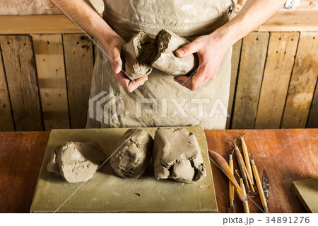 pottery, clay, ceramics art concept - top view on 34891276