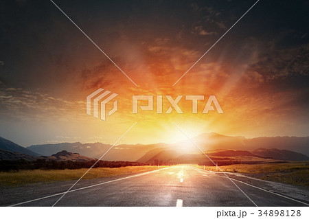 Sunrise above road 34898128