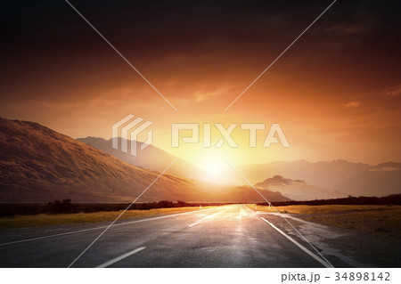 Sunrise above road 34898142