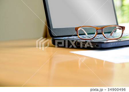 Glasses on laptop Glasses on laptop 34900496
