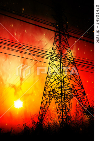 High voltage pole with sunset High voltage pole with sunset 34901420