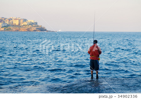 fishing at beach 34902336