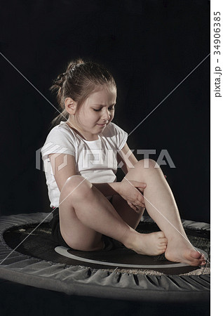 Little caucasian female gymnast crying for a 34906385