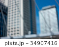The blurry background with high building 34907416