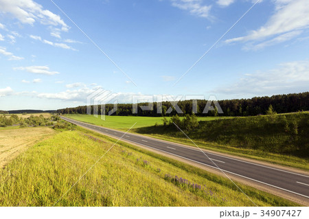 Roads with green grass Roads with green grass 34907427