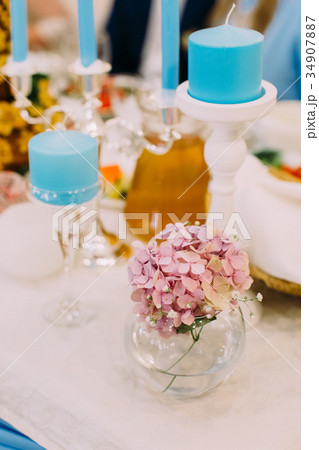 Lovely mini-vase with little pink flowers on the 34907887