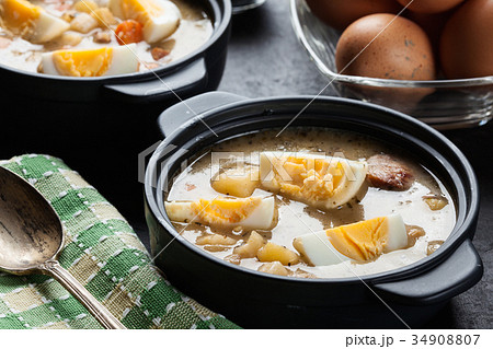 The sour soup made of rye flour with eggs The sour soup made of rye flour with eggs 34908807