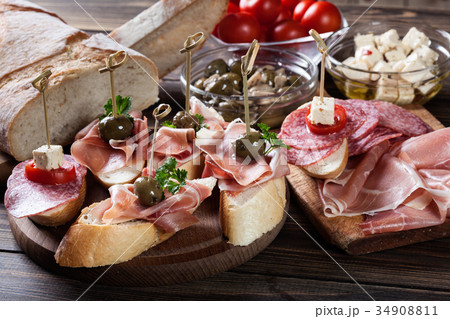 Spanish tapas with slices jamon serrano 34908811