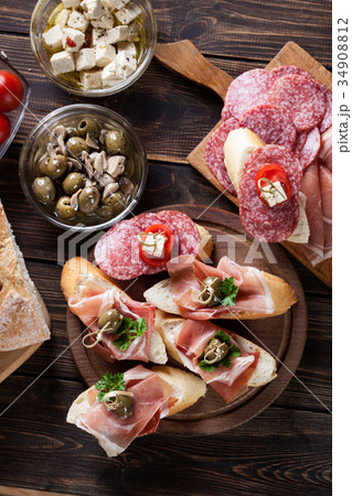 Spanish tapas with slices jamon serrano Spanish tapas with slices jamon serrano 34908812