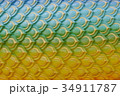 Stucco pattern of green-yellow fish scales. 34911787