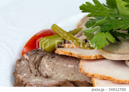 Meat snacks with green parsley 34912780