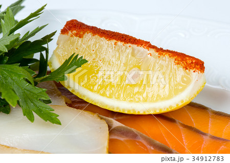 Salmon snacks with lemon Salmon snacks with lemon 34912783