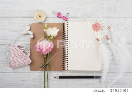 Blank notebook, pink crochet holdel, earphones 34919495