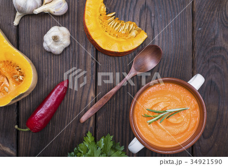 pumpkin soup in a ceramic plate with handles pumpkin soup in a ceramic plate with handles 34921590