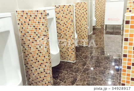 Men's room urinal 34928917
