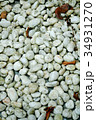 White stones in the garden are the background. 34931270