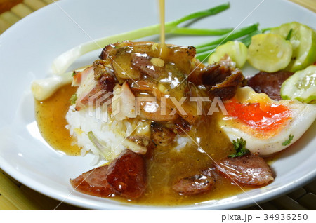 barbecue red pork on rice dressing sweet sauce 34936250