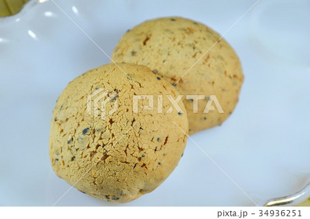 bun filling black sesame on white plate 34936251