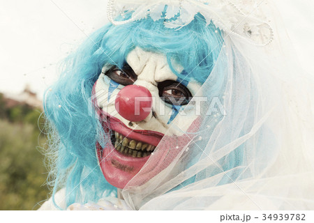 scary evil clown in a bride dress 34939782