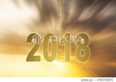 New year 2018 digits text sunset blur background New year 2018 digits text sunset blur background 34939895