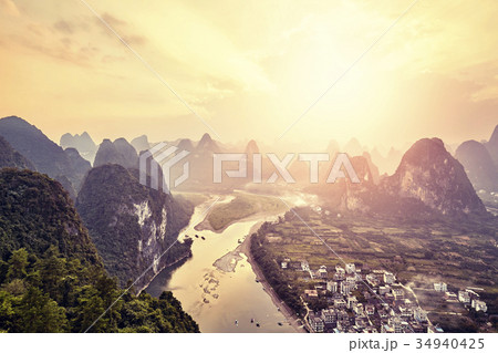 Lijiang River at sunset seen from Xingping village Lijiang River at sunset seen from Xingping village 34940425