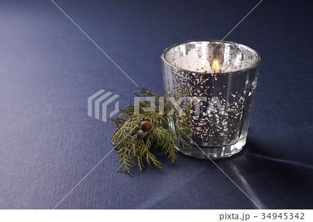 christmas decoration. candle and green twig 34945342
