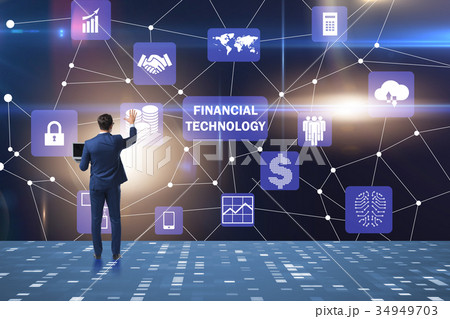 Businessman pressing buttons in fintech concept 34949703
