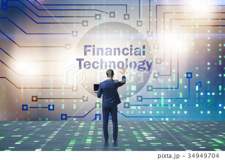 Businessman pressing buttons in fintech concept Businessman pressing buttons in fintech concept 34949704